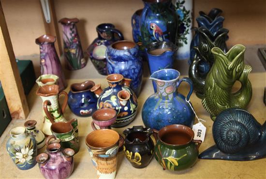 Collection Devon pottery floral decorated vases and carp vases